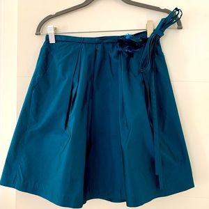 Robert Rodriguez pleated teal skirt with flower belt detail